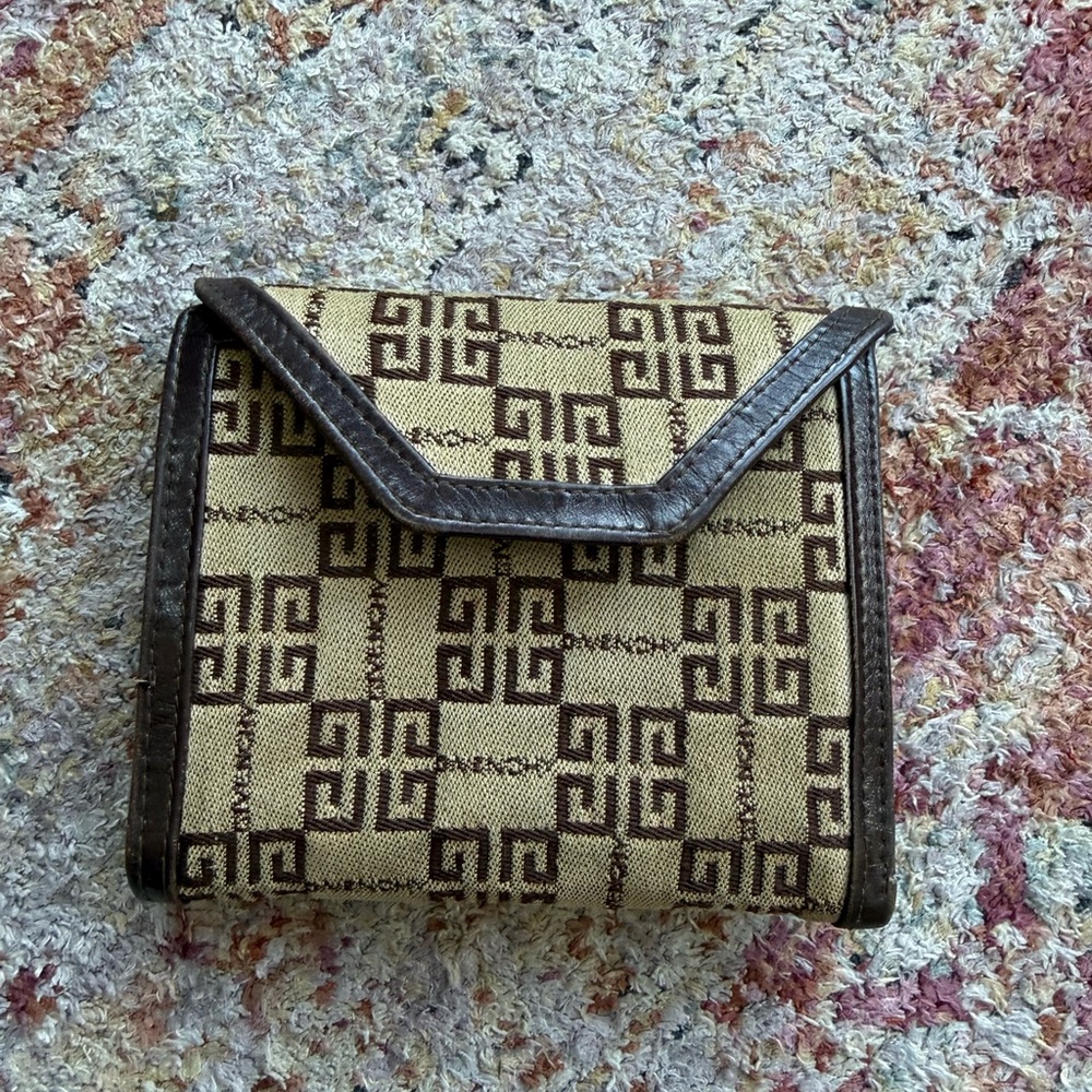 Givenchy brown leather wallet with coin pocket. Fair condition.